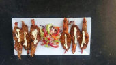Camarones arrecife camarón grande asado al carbón con el aderezo especial estilo Sinaloa y con un toque de mezcal - El Arrecife - Cortes y mariscos