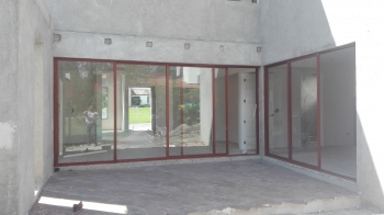 CANCELES CORREDIZOS EN ACABADO MADERA. - Grupo Espacios Creativos - Puebla
